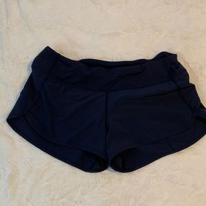 Lululemon low-rise womens running shorts, size 6. Navy